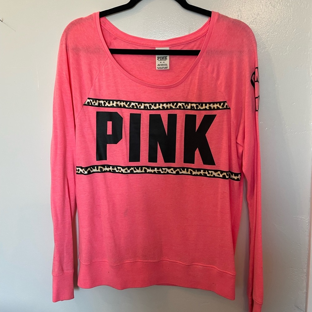 Pink Victorias Secret sweatshirt.